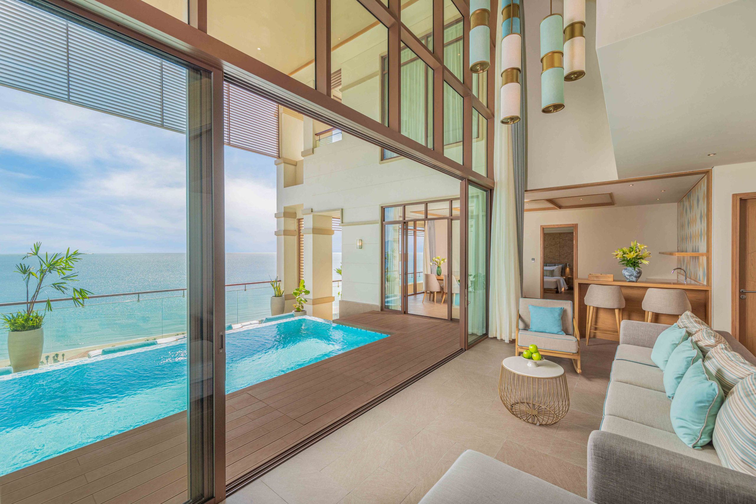 The living area of a private pool loft overlooking the private pool