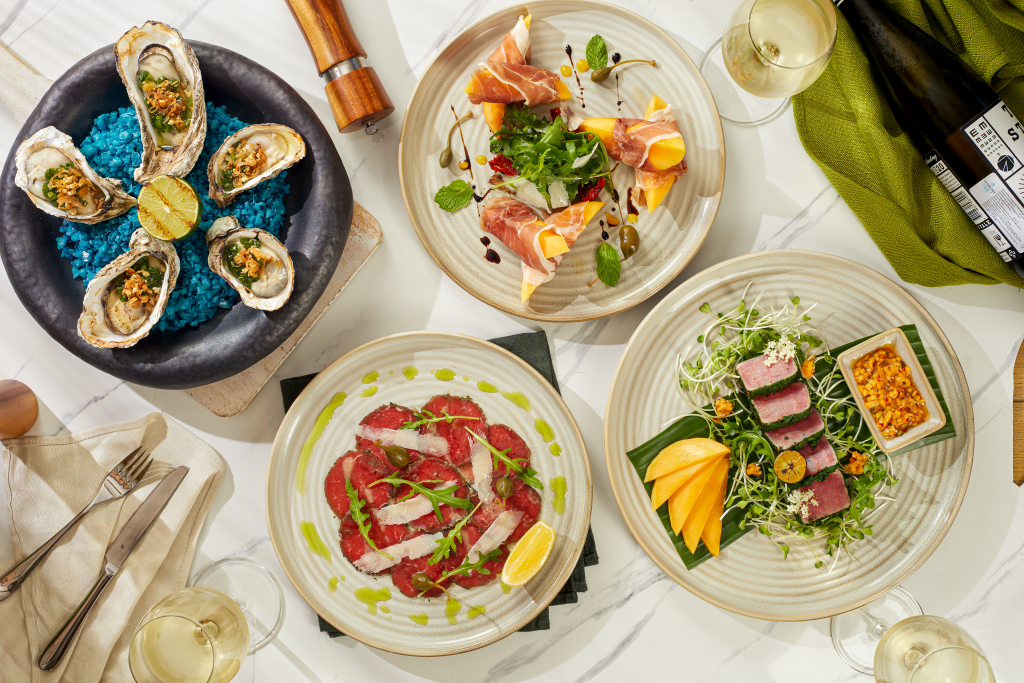 An assortment of food on a table at Fusion Resort