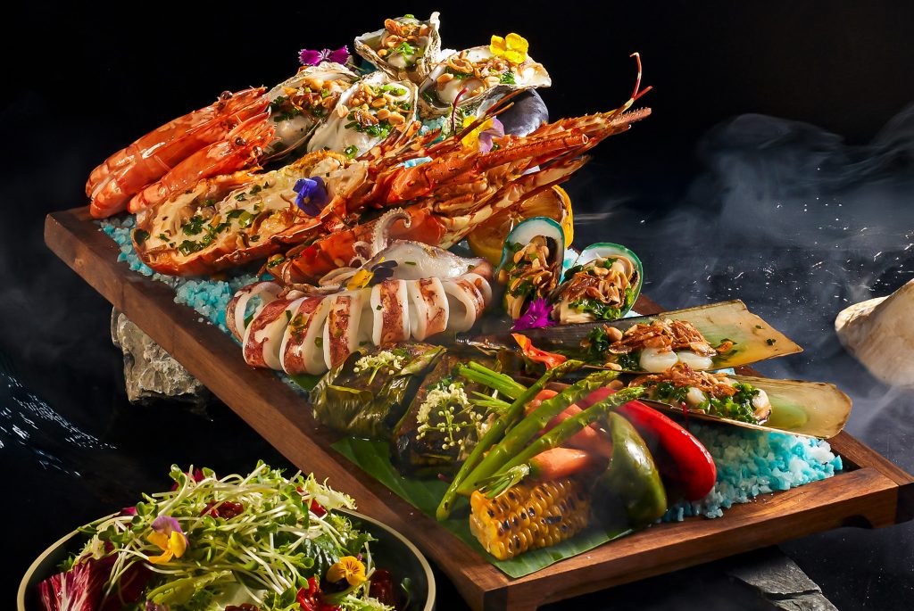 A platter of cooked seafood at Fusion Resort