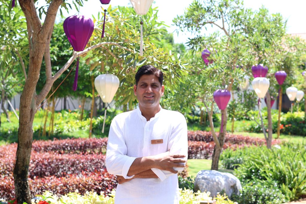 Wellness Master at Fusion Resort & Villas Da Nang guiding holistic healing and mindfulness practices.